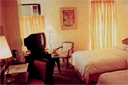 Sarrosa International Hotel & Residential Suites Room